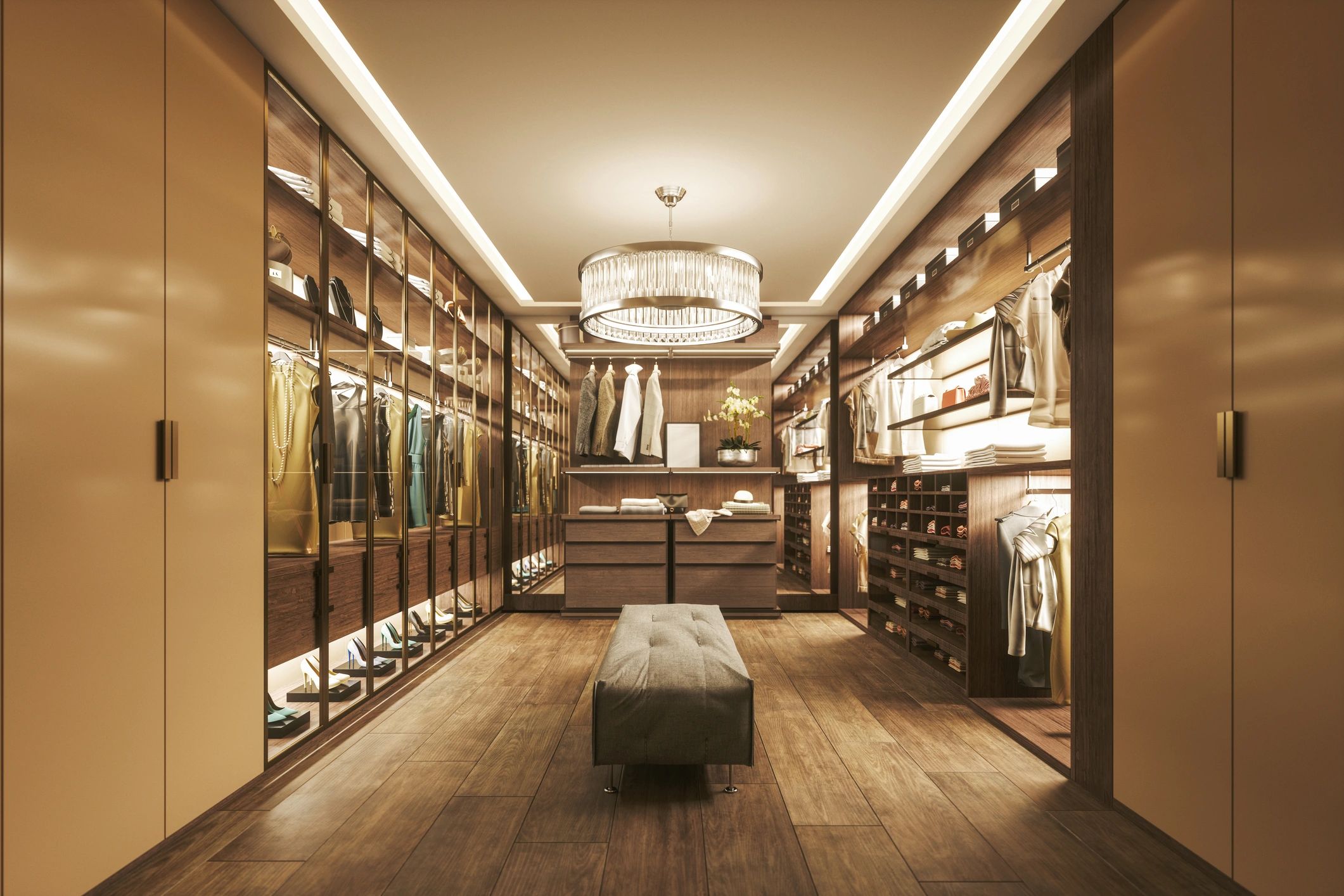 Luxury custom walk-in closet with wood shelving and lighting