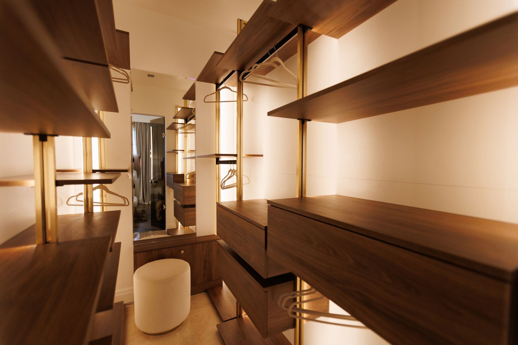 Spacious custom closet with modern cabinetry and storage